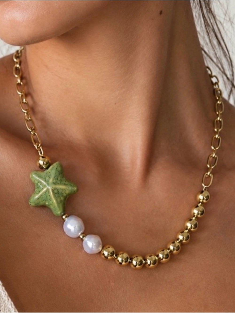 Gold Beaded Necklace with Green Star Pendant and Pearl Accents